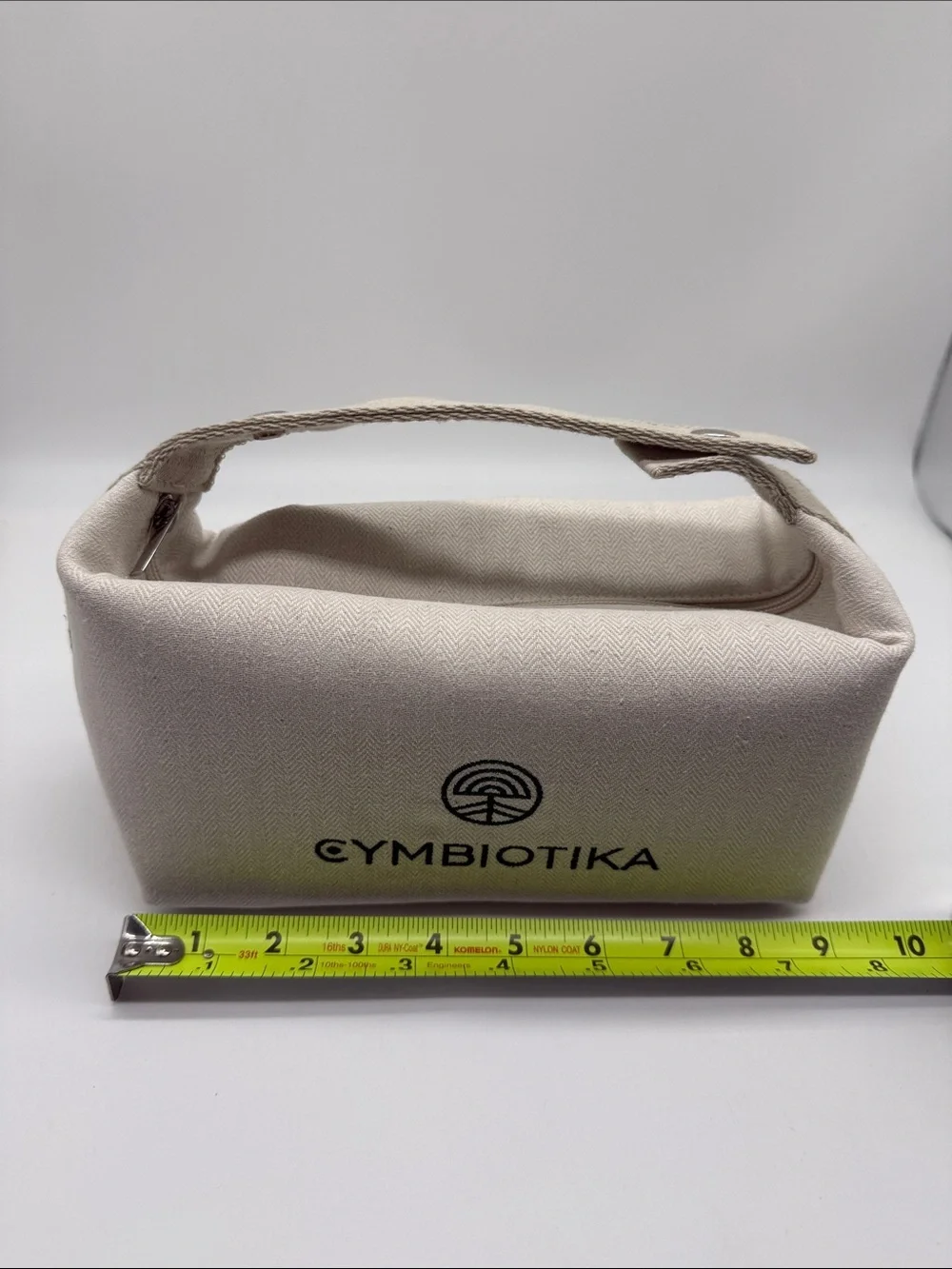 Cymbiotika Off White Herringbone Canvas Toiletry Cosmetic Travel Bag NWOT